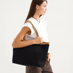 hover | Model shown holding the Lightweight Zip Tote in Espresso Open Knit.