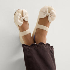 hover | Model wearing The Kids Big Bow Mary Jane in Conch.