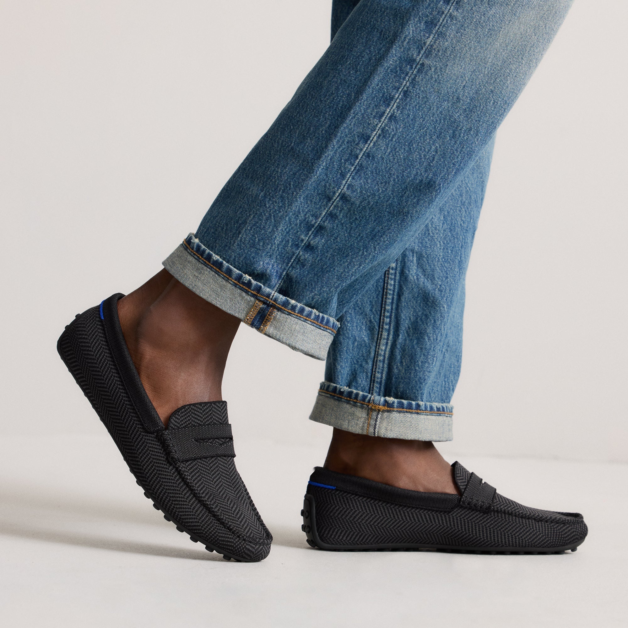 hover | Model wearing The Men's Daily Driver in Carbon Herringbone. 