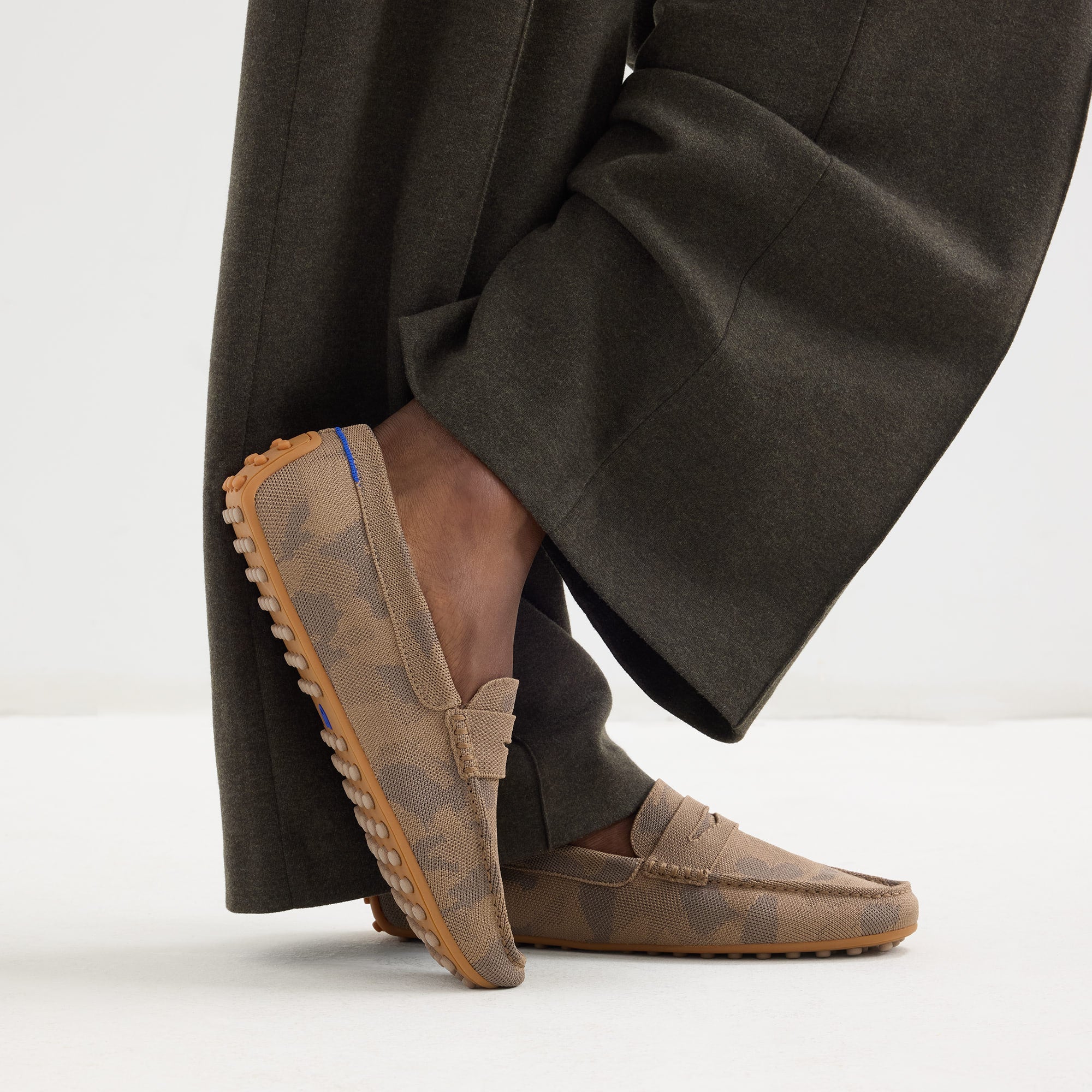 hover | Model wearing The Men's Daily Driver in Brown Camo. 