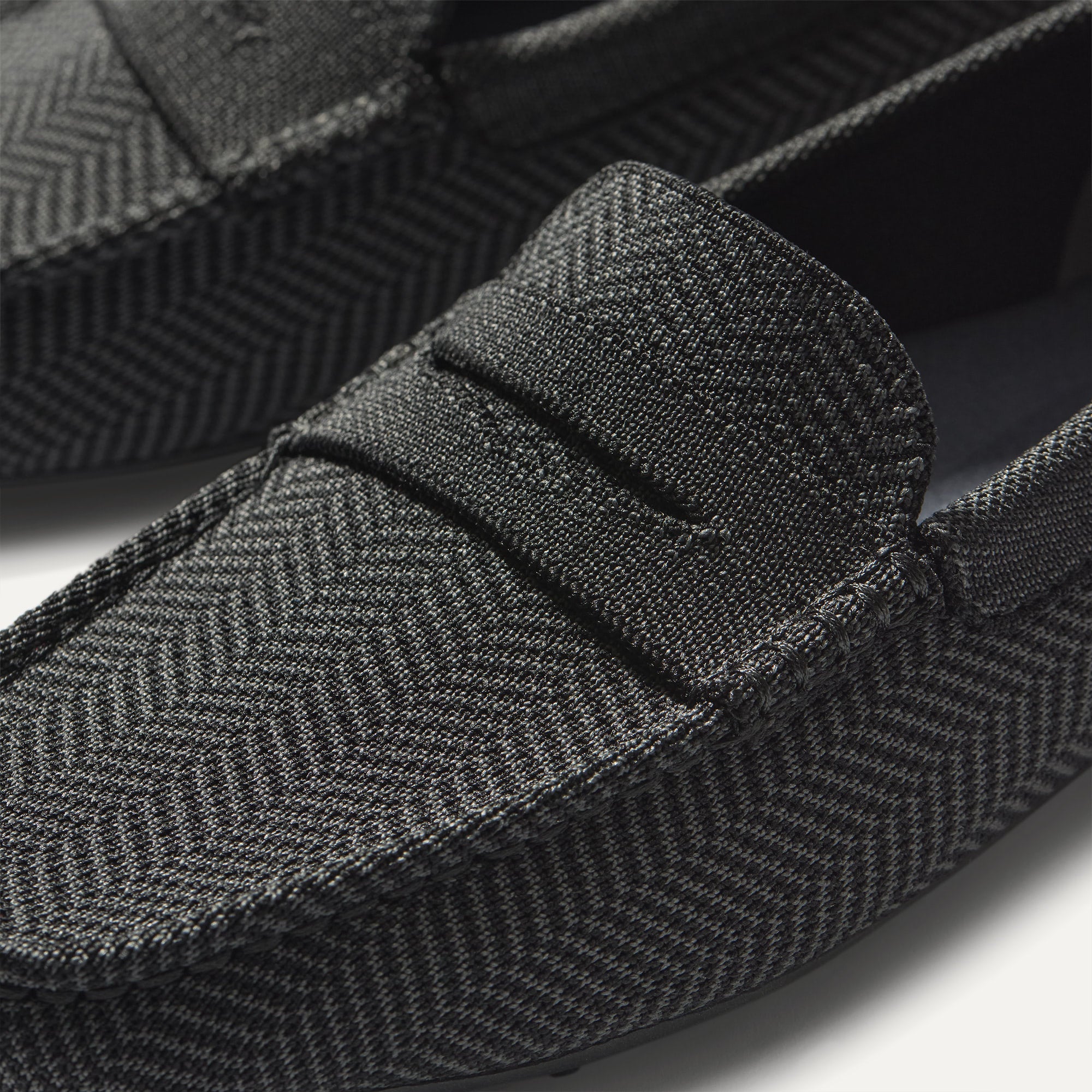 Close up of the toe and vamp of The Men's Daily Driver in Carbon Herringbone. 