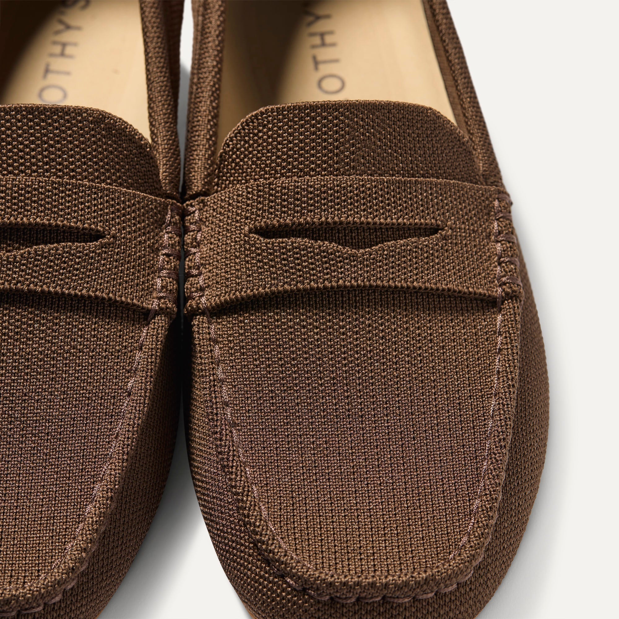 Close up of the toe and vamp of The Men's Daily Driver in Dark Roast. 