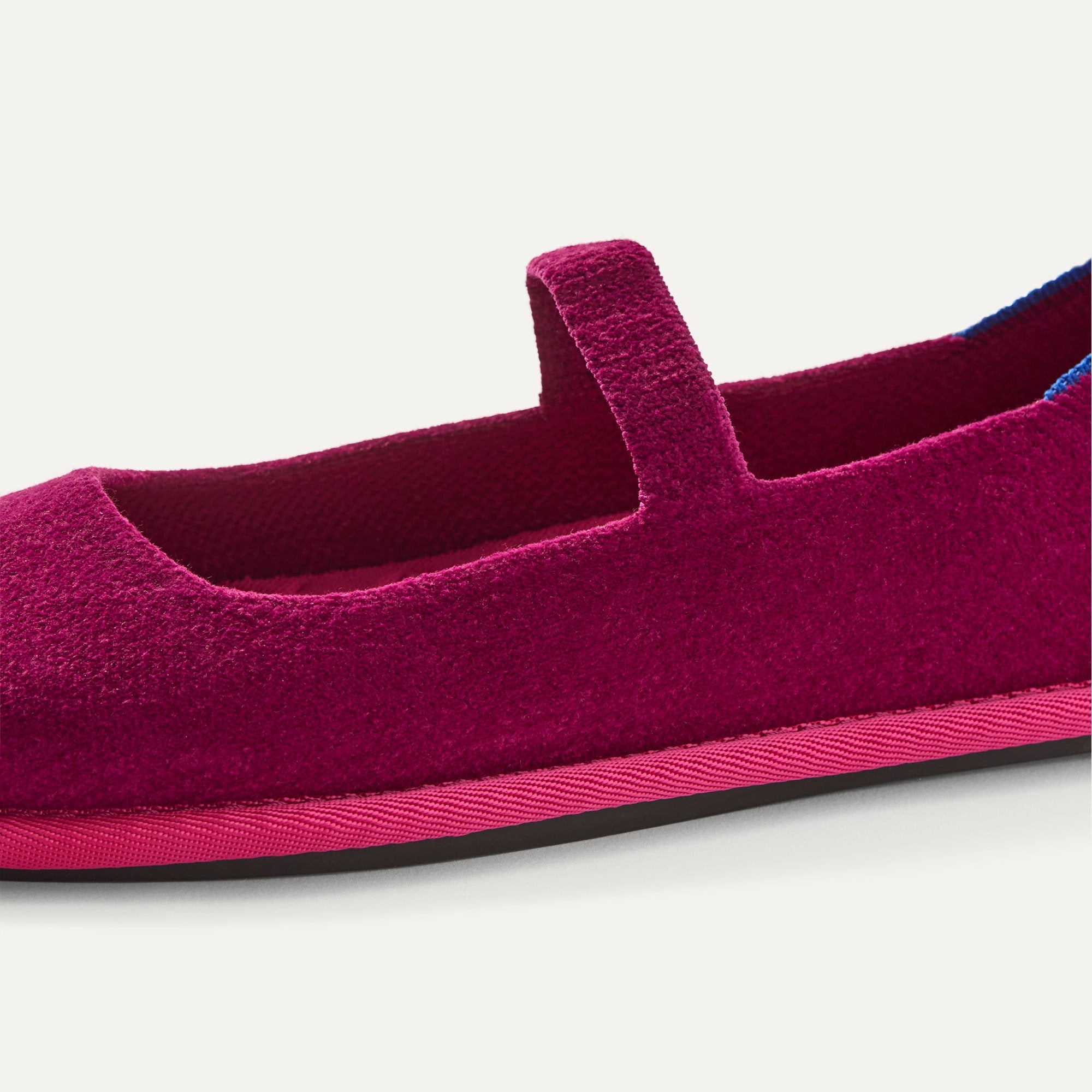 macro | The vamp and top strap of The Cruiser Mary Jane in ReVelvet Berry Pop. 