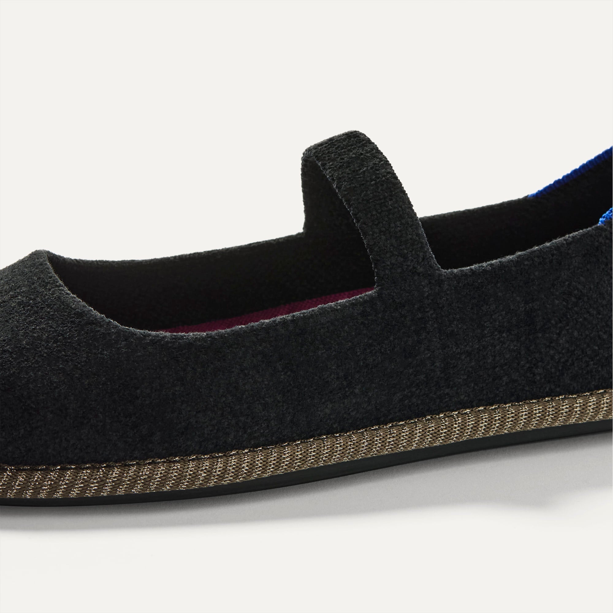 macro | The vamp and top strap of The Cruiser Mary Jane in ReVelvet Black. 