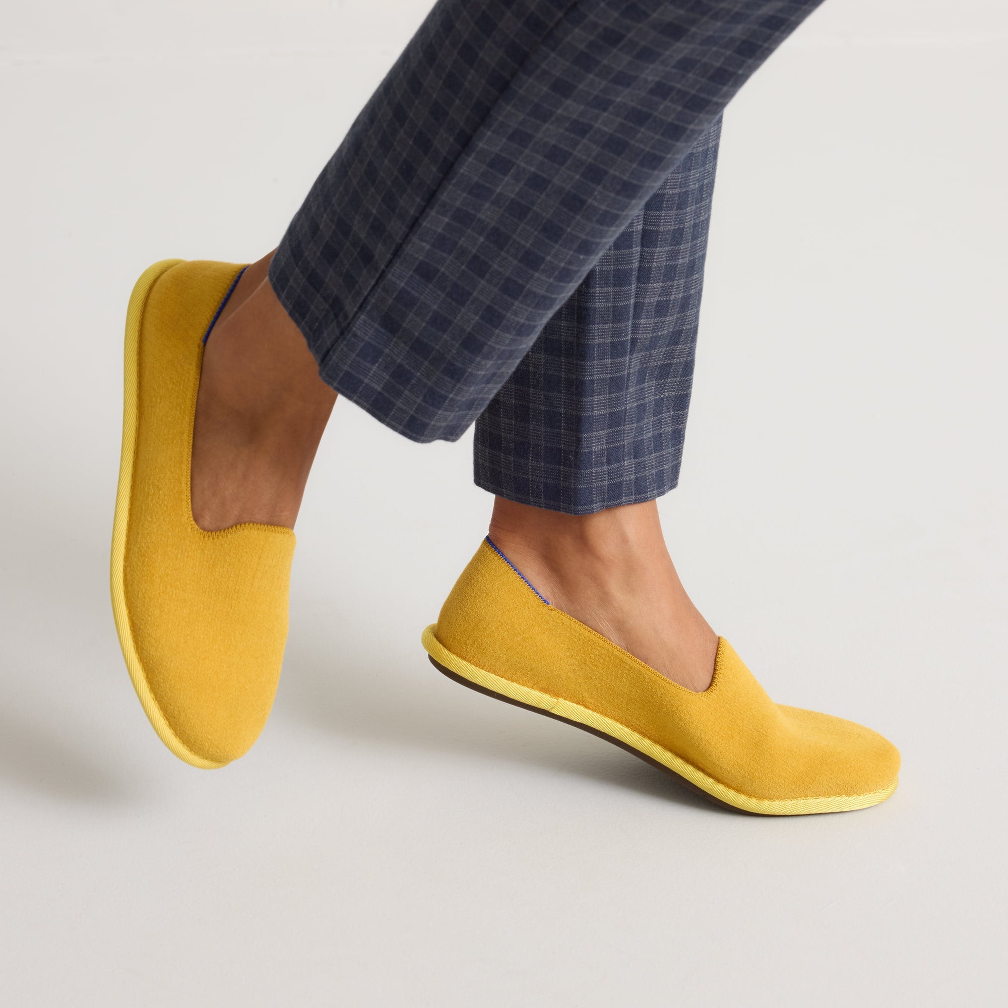 hover | Model wearing The Cruiser Loafer in ReVelvet Saffron.