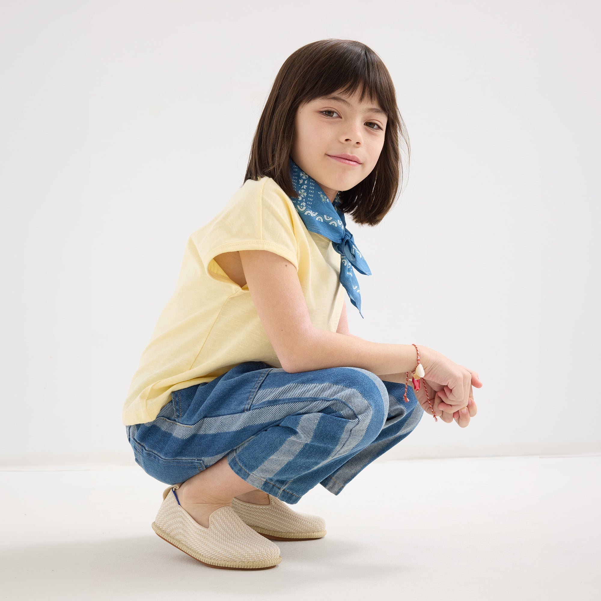 model | Alternate  of Child wearing The Mini Loafer in Cream Puff Stripe. 