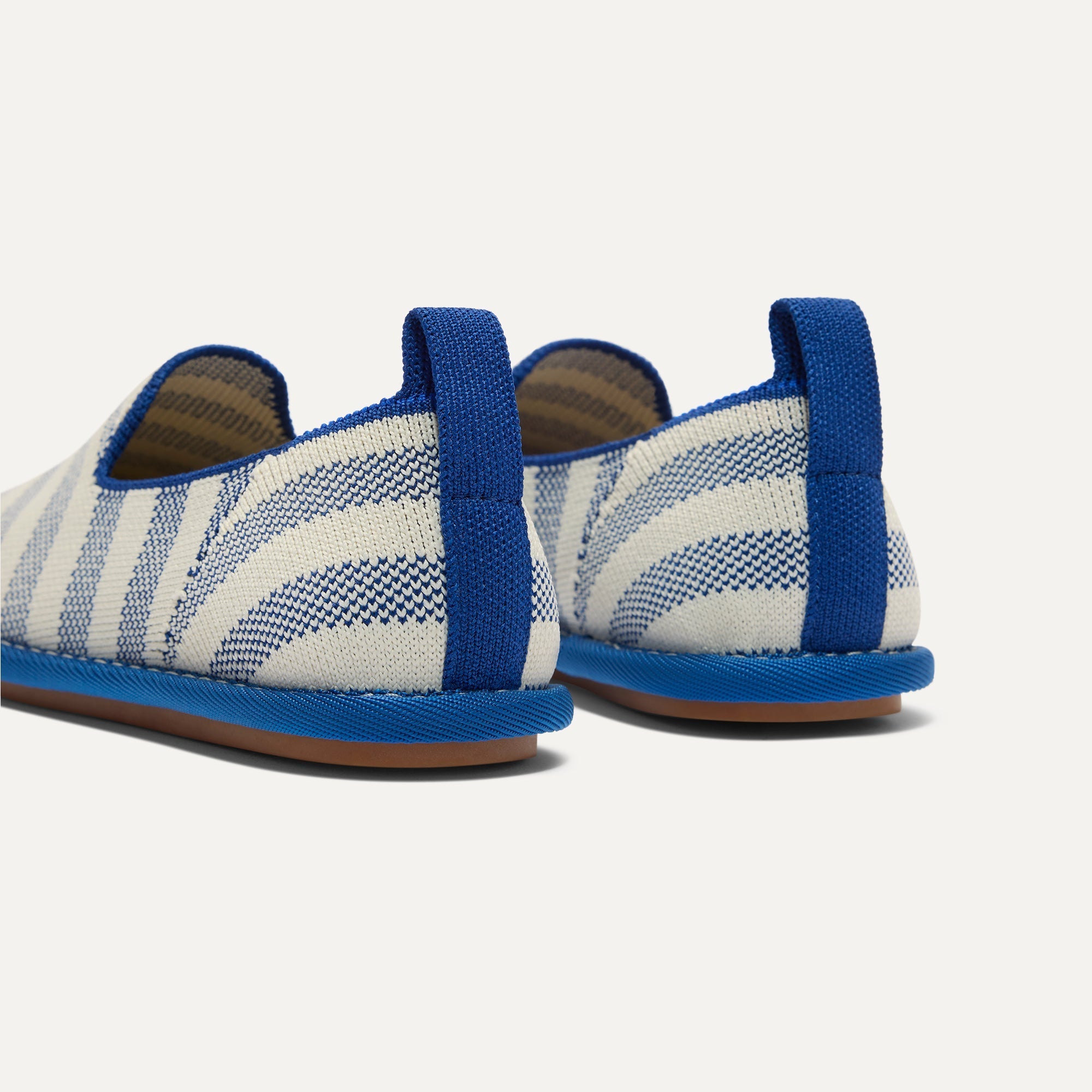 The Mini Loafer in Harbor Stripe shown from the back view with the heel detail.