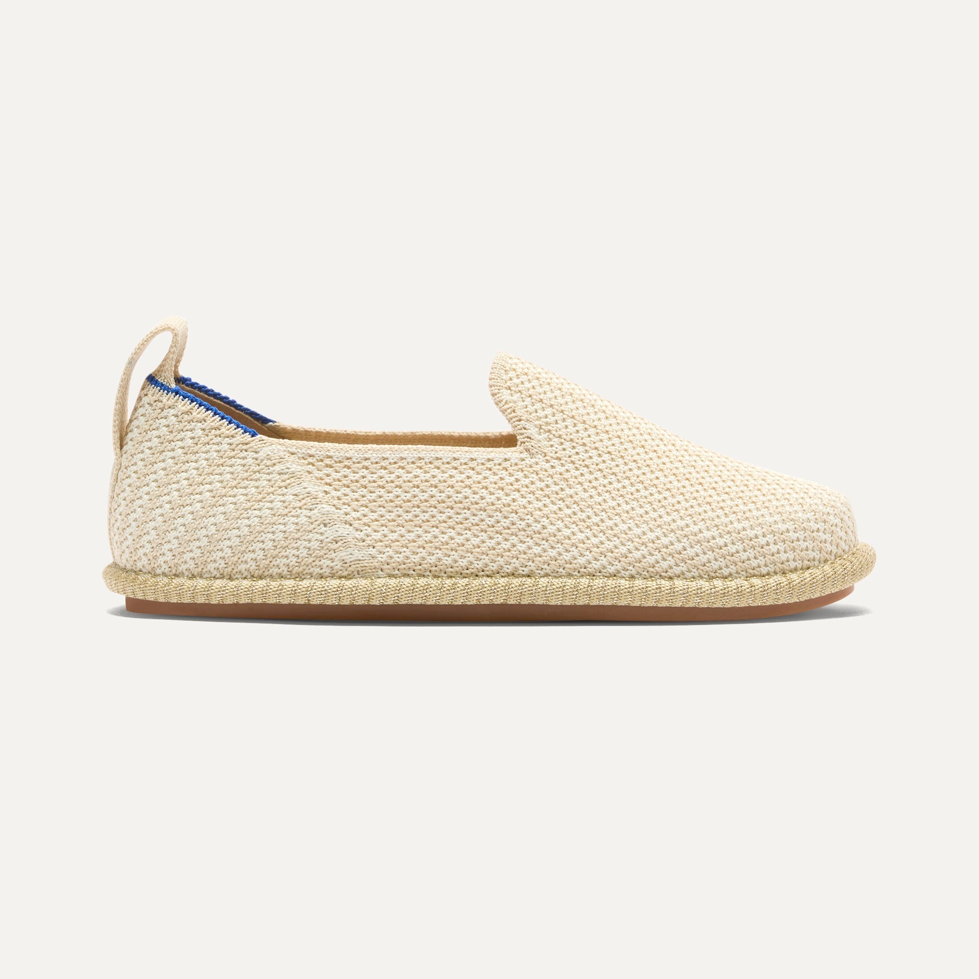 side | The Mini Loafer in Cream Puff Stripe shown from a side view showing the outsole.