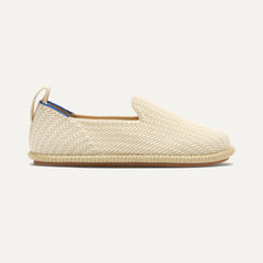 side | The Mini Loafer in Cream Puff Stripe shown from a side view showing the outsole.