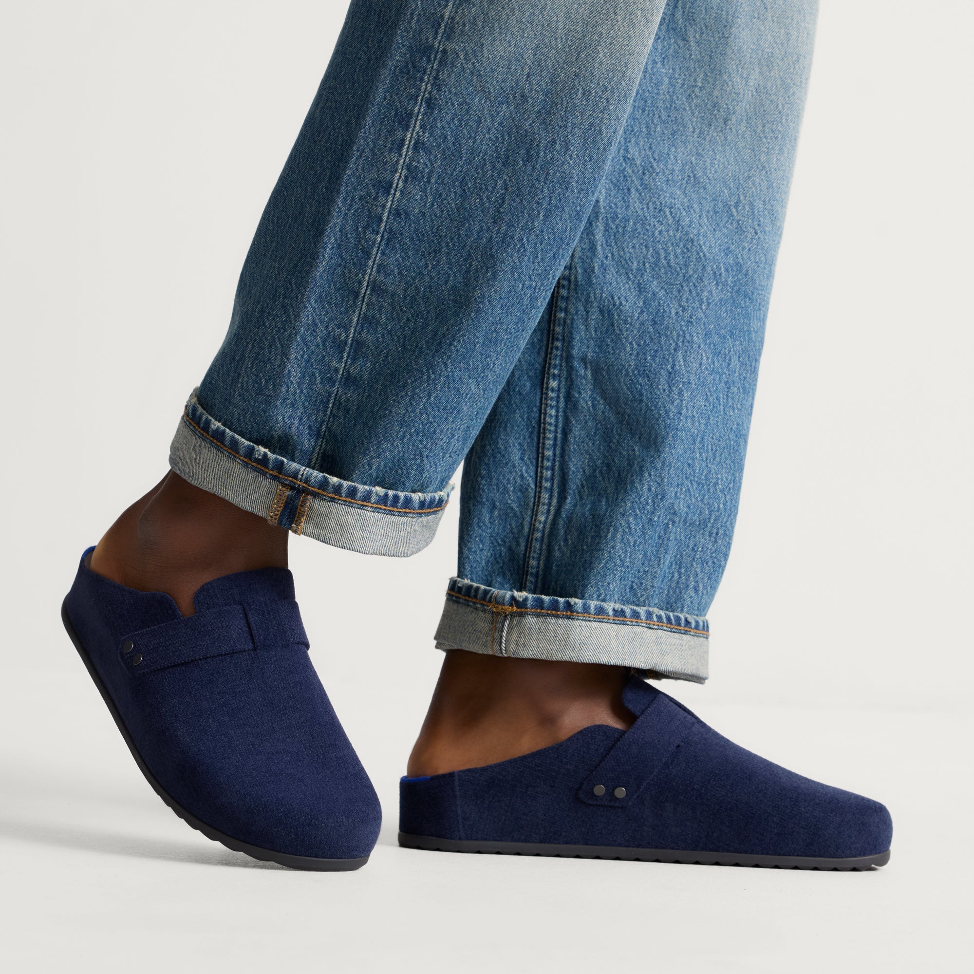 hover | Model wearing The Men's Clog in ReVelvet™ Deep Navy.