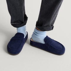 hover | Model wearing The Penny Clog in ReVelvet™ Navy.