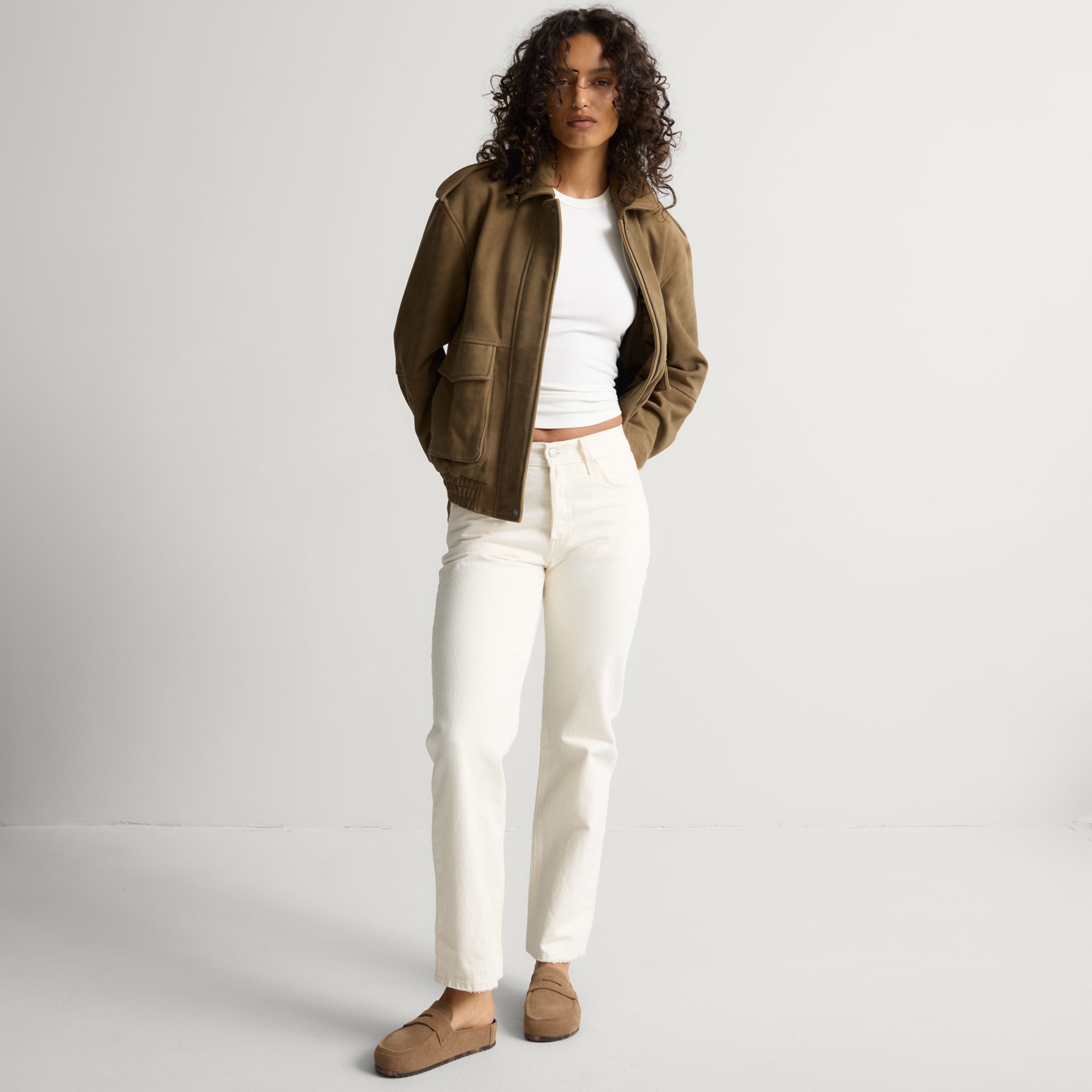 model | An alternate image of a model wearing The Penny Clog in ReVelvet Portobello.