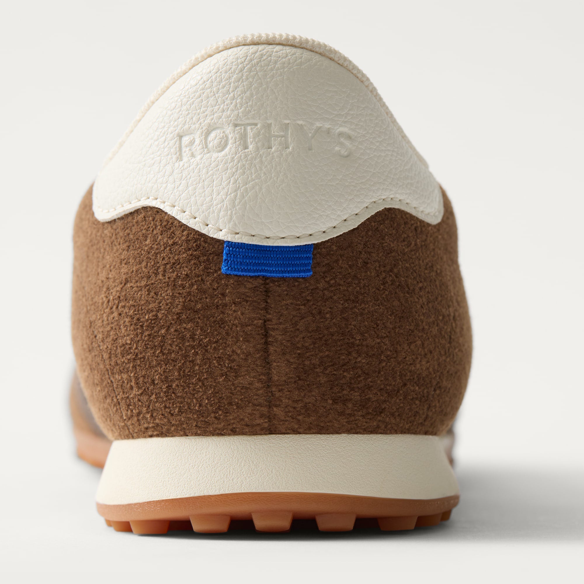 Close up of the heel of The Ivy Sneaker in ReVelvet Cinnamon.