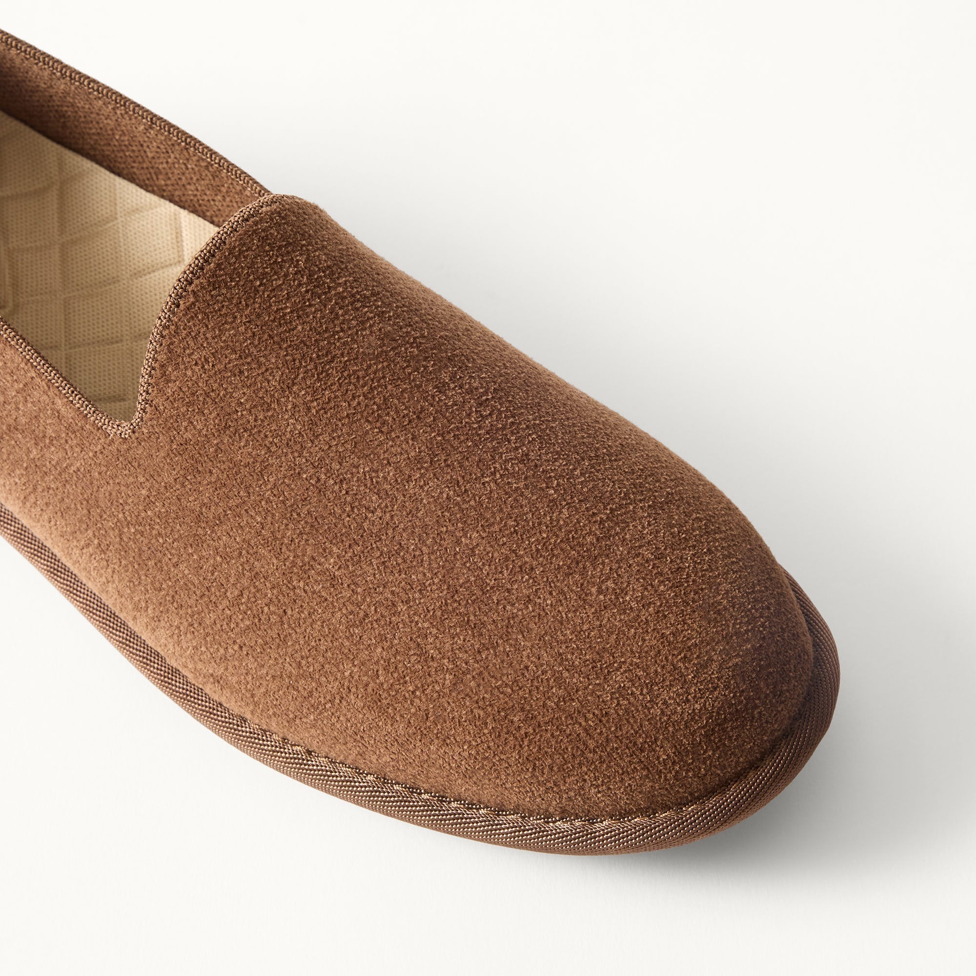 Close up of the toe and vamp of The Men's Cruiser Loafer in ReVelvet™ Umber. 