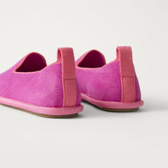 The Mini Loafer in ReVelvet™ Sweetpea shown from the back view with the heel detail.