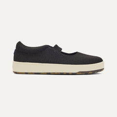 side | The Kids MJ Sneaker in Black shown from the side.