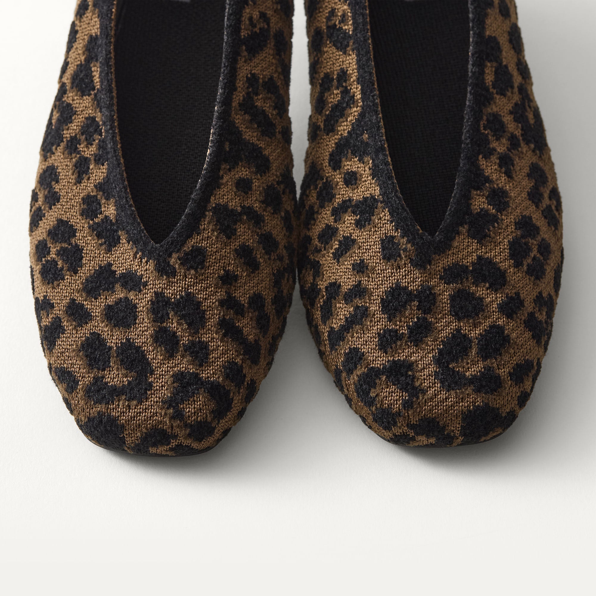 Close up of the toe and V-shaped vamp on The Max Square Ballerina in ReVelvet Spotted Cat.