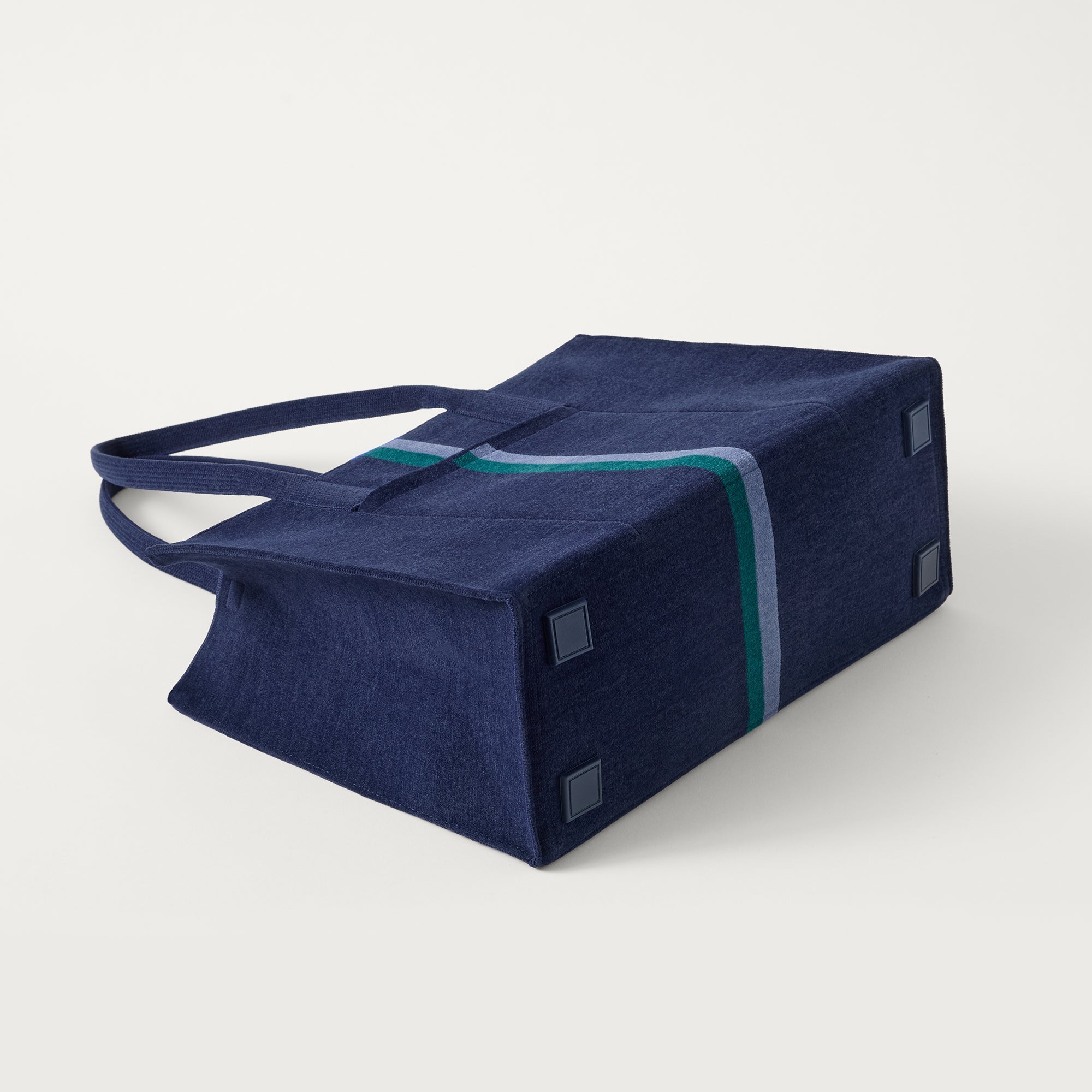 The Classic Tote in ReVelvet Peacock, shown from the bottom. 