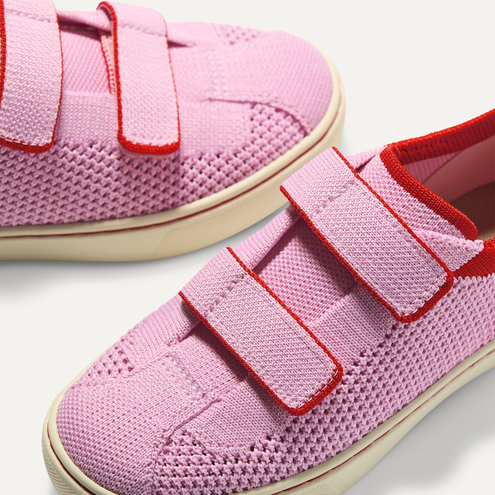 Close up of the vamp of The Kids Strap Sneaker in Tutu Open-Knit. 