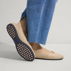 hover | Model wearing The Daily Flat in Ecru. 